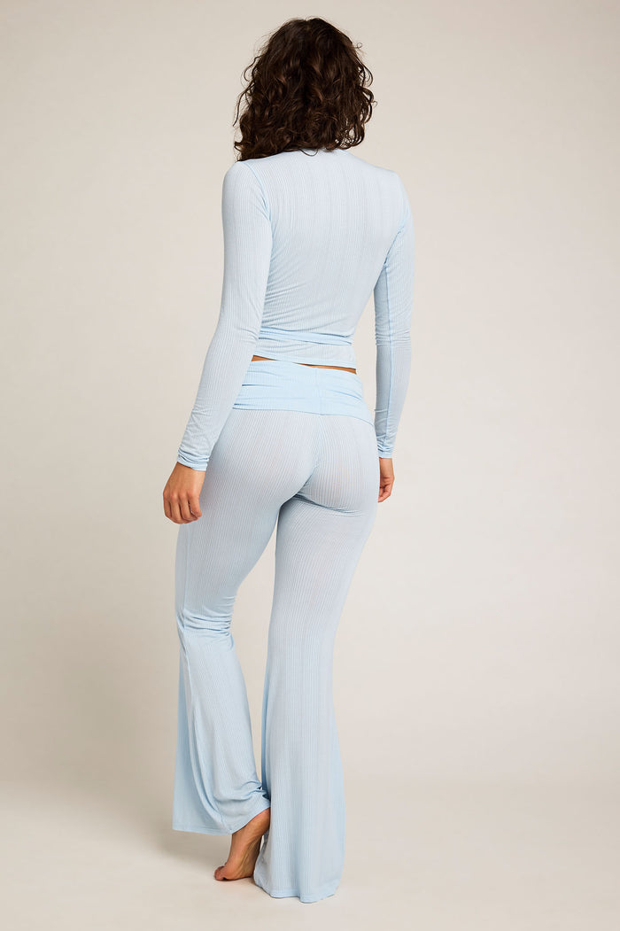 Light blue striped pants with back seam and flared wide legs